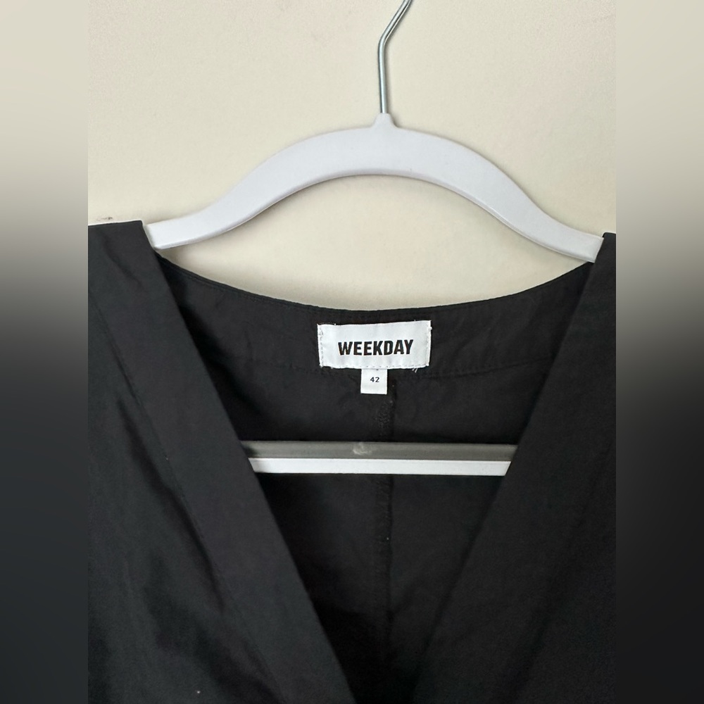 Urban Outfitters Weekday jumpsuit with utilitarian belt.